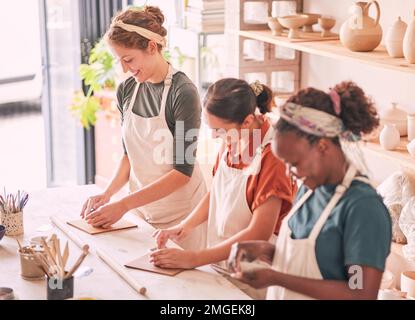 Happy, pottery and people in row working together for creative process, production and productivity. Happiness, passion and talent of interracial Stock Photo