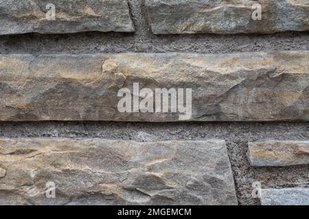 Large stone wall grey texture background, close up Stock Photo