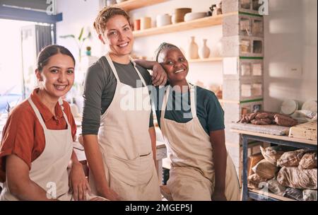 Diversity, portrait and business with employees, store and smile with aprons, confident and teamwork. Multiracial, coworkers and happiness in shop Stock Photo