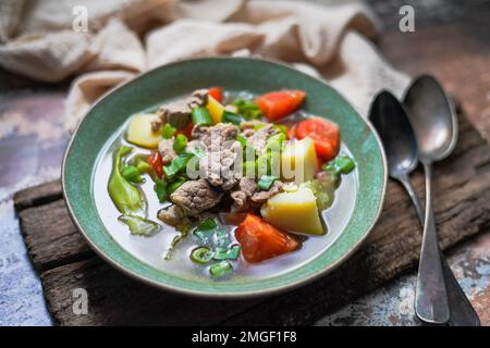 Sop Daging is Indonesian clear soup with beef and vegetables Stock Photo