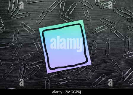 Paperclips Around Important Informations On Desk. Presented Recent Updates. Stock Photo