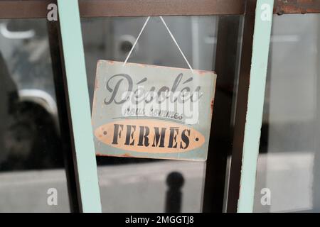 vintage shop sign desoles nous sommes fermes in french text means english shop sorry we are closed Stock Photo