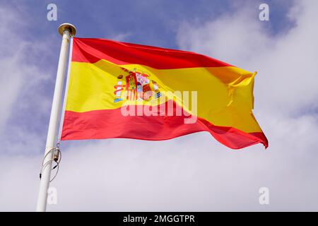 spain flag spanish float over blue sky in mat with wind Stock Photo - Alamy