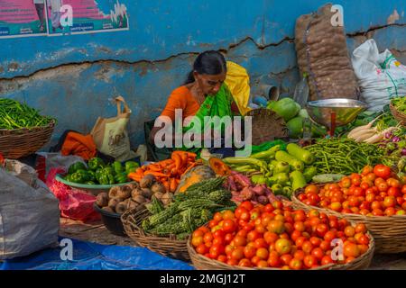 Puttaparthi, Andra Pradesh - India - January 21.2023: Women selling vegetables on the local Indian market Stock Photo