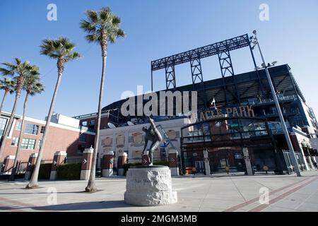 The statue of former pitcher Juan Marichal is shown in front of sign for  Oracle Park before an exhibition baseball game between the San Francisco  Giants and the Oakland Athletics in San Francisco, Monday, March 25, 2019.  (AP Photo/Jeff Chiu Stock Phot