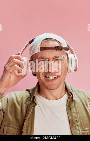 Chinese Young Man Playing Video Games Wearing Headphones Looking To Side,  Relax Profile Pose with Natural Face and Confident Smile Stock Image -  Image of gamer, natural: 273166059
