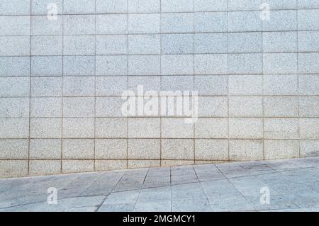 Gray wall from stone blocks for advertisement background. Stock Photo