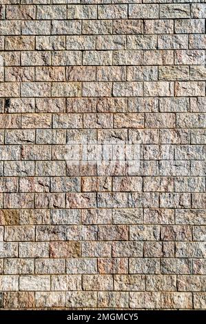 Gray wall from stone blocks for advertisement background. Stock Photo