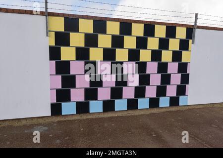 Painted optical illusion wall art on Great Yarmouth seafront promenade Stock Photo