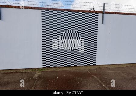 Painted optical illusion wall art on Great Yarmouth seafront promenade Stock Photo