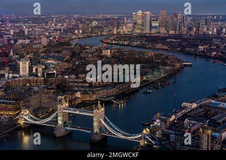 A View Of Tower Bridge, The River Thames and Canary Wharf at Night from The Shard, London, UK. Stock Photo