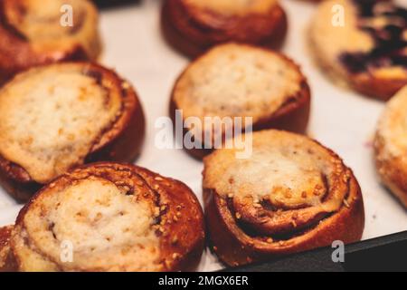 Variety assortment of traditional finnish sweets and pastries with cinnamon bun, and cardamon roll and rolls, butter bun and other, korvapuusti, laski Stock Photo