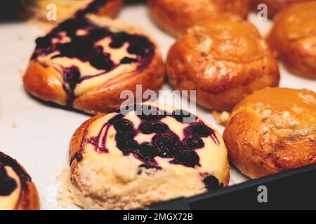 Variety assortment of traditional finnish sweets and pastries with cinnamon bun, and cardamon roll and rolls, butter bun and other, korvapuusti, laski Stock Photo