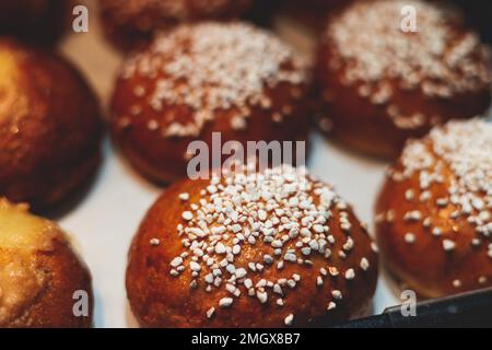 Variety assortment of traditional finnish sweets and pastries with cinnamon bun, and cardamon roll and rolls, butter bun and other, korvapuusti, laski Stock Photo