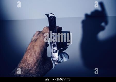 Santa Clara, United States - Jul 14, 2022: POV IT engineer holding in dark server room new NVIDIA T600 video card with NVIDIA Turing GPU with focus on the new Mini DisplayPort conneciton Stock Photo