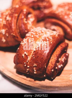 Variety assortment of traditional finnish sweets and pastries with cinnamon bun, and cardamon roll and rolls, butter bun and other, korvapuusti, laski Stock Photo