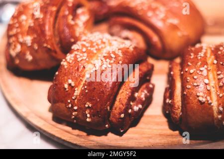 Variety assortment of traditional finnish sweets and pastries with cinnamon bun, and cardamon roll and rolls, butter bun and other, korvapuusti, laski Stock Photo