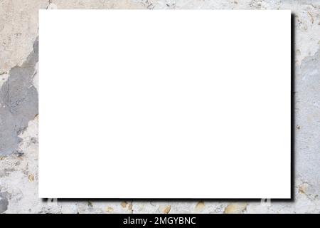Empty white horizontal rectangle poster mockup with soft shadow on old used cracked grey concrete wall background Flat lay top view Stock Photo