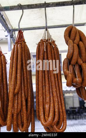 Detail of dried meat with spices in an old street market, food Stock Photo