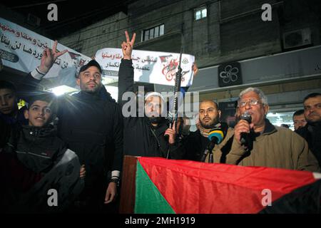 Gaza, Palestine. 26th Jan, 2023. 26 January 2023, Palestinian Territories, Gaza City: Palestinian demonstrators during a demonstration in the Jabalia camp following an Israeli strike on the Jenin refugee camp in the occupied West Bank - An Israeli raid on the Jenin refugee camp in the West Bank killed nine Palestinians, including an elderly woman, Palestinian officials said, and the army was also accused of using tear gas inside the hospital. -After the Israeli attack on Jenin camp The Palestinian National Authority announced that security coordination with the Israeli government no longer exi Stock Photo