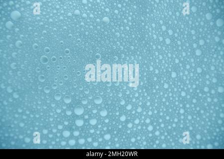 Blue soap bubbles on the water abstract light illumination For Background Stock Photo