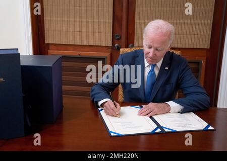President Joe Biden signs the bipartisan year-end omnibus on Thursday, December 29, 2022, in Christiansted, St. Croix.. (Official White House Photo by Erin Scott) Stock Photo