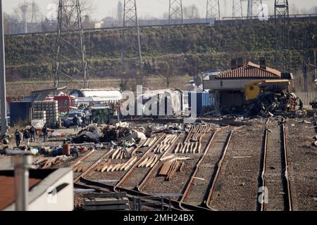 A Derailed Train Engine Car Is Seen At Left As The Train Passenger ...