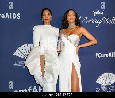 Cindy Bruna, left, and Lais Ribeiro attend the amfAR Gala New York AIDS