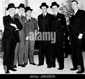 John D. Rockefeller, Jr., (left) as he left the Capitol in