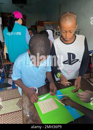 children's art and crafts for charity .kids activity for poor people in zanzibar, Tanzania. Stock Photo