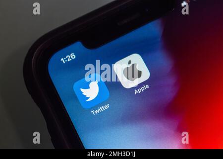 Vancouver, CANADA - Jan 23 2023 : Twitter and Apple icons seen in an iPhone screen Stock Photo