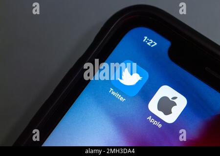Vancouver, CANADA - Jan 23 2023 : Twitter and Apple icons seen in an iPhone screen Stock Photo