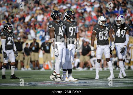 Jacksonville Jaguars defensive end Josh Allen (41) defends during the first  half of an NFL football game against the New England Patriots, Sunday, Jan.  2, 2022, in Foxborough, Mass. (AP Photo/Stew Milne