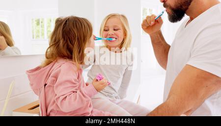 Father, kids and brushing teeth dental healthcare, cleaning and bathroom hygiene in family home. Happy dad teaching young girl children oral wellness Stock Photo