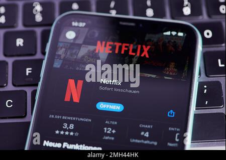 Mainz, Germany - September 25, 2022: icon of the netflix app on a German smartphone in app store Stock Photo