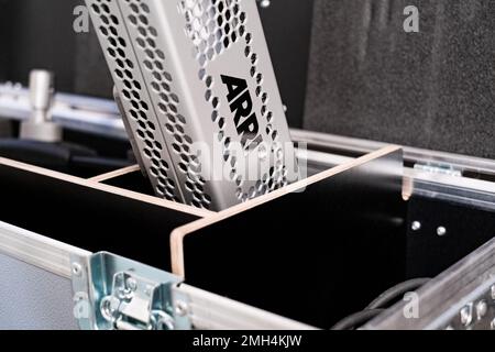 Prague, CZ - 19 December 2021: ARRI cinema soft light equipment. movement and set up filming. Take out Battery for sky panel light. Editorial Stock Photo