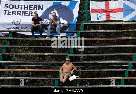 Fans watch the fourth cricket test match between South Africa and England at the Wanderers stadium in Johannesburg, South Africa, Friday, Jan. 24, 2020. (AP Photo/Themba Hadebe)