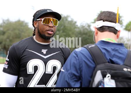 AFC running back Derrick Henry of the Tennessee Titans (22) and quarterback Lamar  Jackson of the Baltimore Ravens (8) during the Pro Bowl, Sunday, Jan. 26,  2020, at Camping World Stadium in