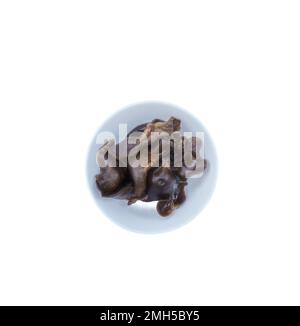 On white plate, Chinese chestnuts sold in the US. There are photo and vector versions for design idea. Chinese chestnuts are bigger size than others Stock Photo