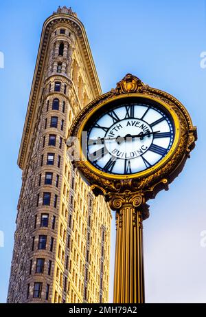 The Flatiron Building is located at the intersections of Fifth Avenue, Broadway and East Twenty-Second Street, New York City. This neighborhood of Man Stock Photo