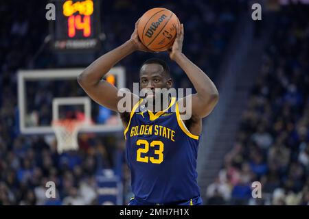 FILE - Golden State Warriors forward Jonathan Kuminga stands on