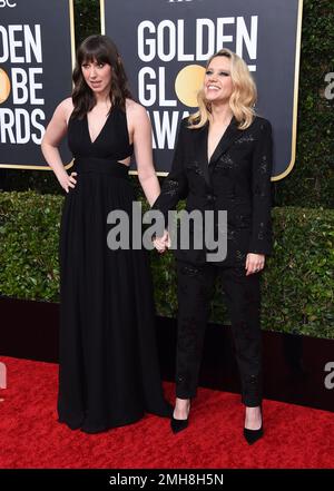 Kate McKinnon, right, and her sister Emily Lynne Berthold arrive at the