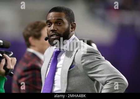 Minnesota Vikings Wide receiver Randy Moss stands on the sidelines of the  Louisiana Superdome before the game in New Orleans October 17, 2004. Moss  was sidelined in Sunday night's game against the