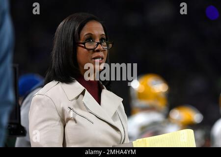 ESPN reporter Lisa Salters stands on the sideline during the