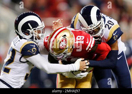 San Francisco 49ers wide receiver Deebo Samuel (19) runs past Los Angeles  Rams safety Jordan Fu …