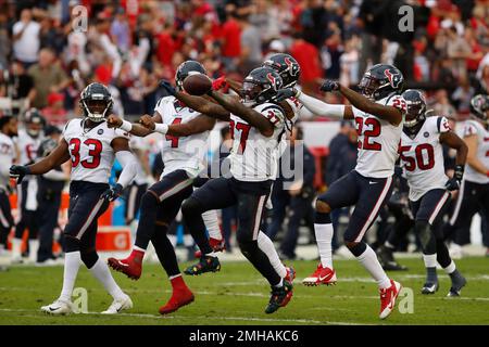 Houston, Texas, USA. 29th Dec, 2019. Tennessee Titans tight end MyCole  Pruitt (85) carries the ball upfield after a catch while Houston Texans  safety Jahleel Addae (37) defends during the third quarter