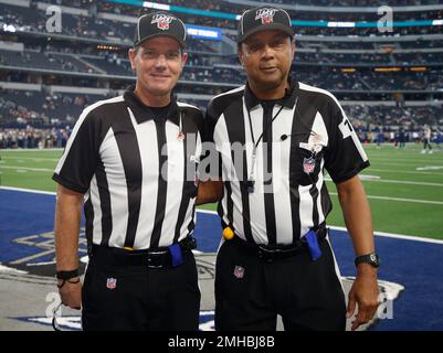 NFL game officlals, from left, replay official Brian Matoren, down judge  Tom Stephan (68), field judge Lee Dyer (27), umpire Ruben Fowler (71),  referee Walt Anderson (66), side judge Rick Patterson (15)