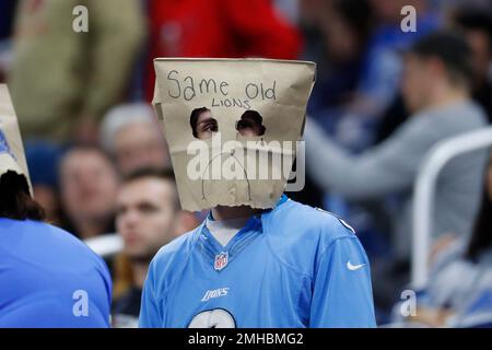 A Detroit Lions fan wears a bag during the fourth quarter of an NFL  football game against the Chicago Bears at Ford Field in Detroit, Sunday,  Dec. 5, 2010. (AP Photo/Carlos Osorio