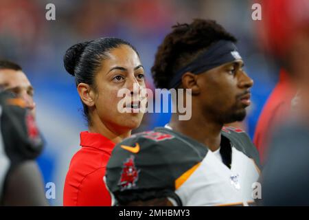 Tampa Bay Buccaneers assistant strength and conditioning coach Maral  Javadifar talks with kicker Matt Gay (9) during the first half of an NFL  football game against the Detroit Lions, Sunday, Dec. 15