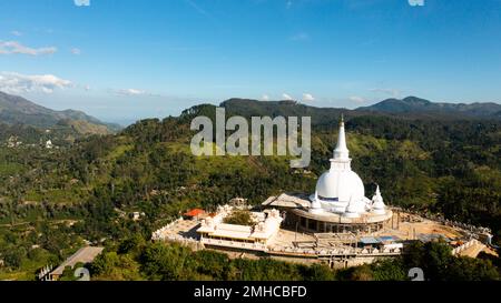 A Buddhist temple in a mountain province on top of a mountain. Mahamevnawa Buddhist Monastery. Bandarawela, Sri Lanka. Stock Photo